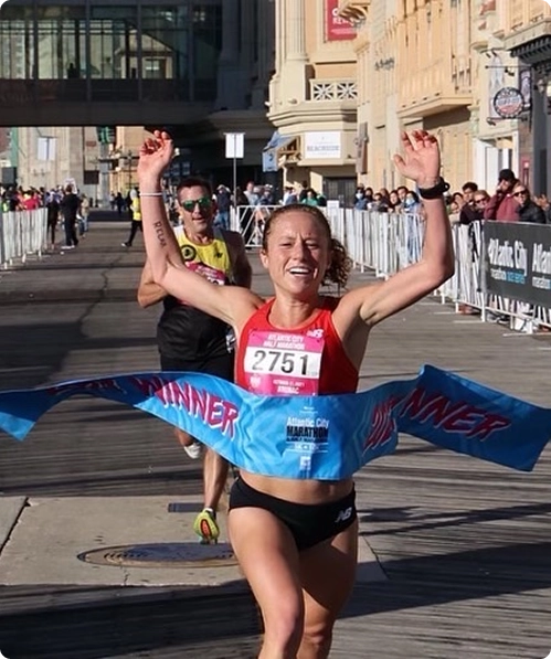 Coach Megan Pappalardo winning a race