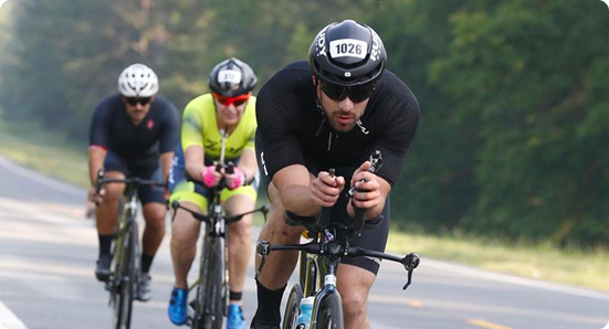Triathlete cycling during a race