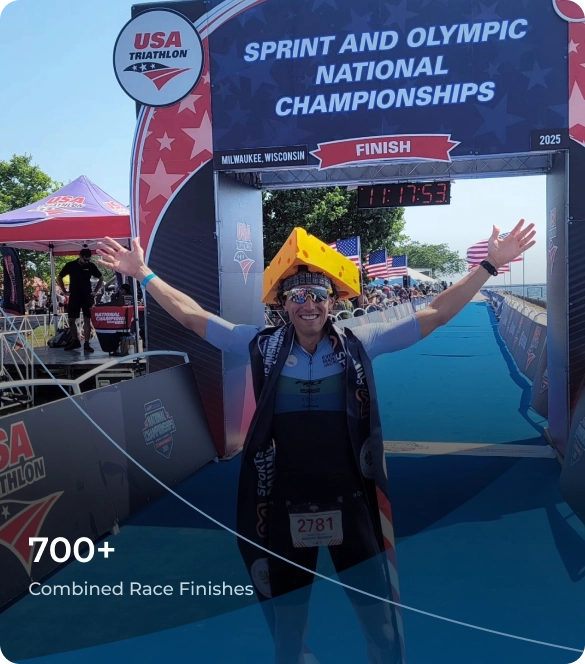 Athlete celebrating at a race finish line