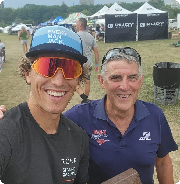 Cadence coach and athlete at a race event